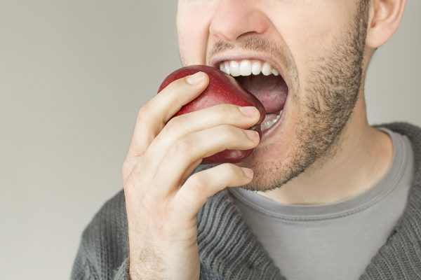 eating apples could be difficult for denture users